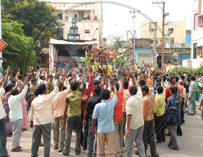 Crowd Of People Dancing and Celebrating in joy At a Road Rally in Movie Working Stills