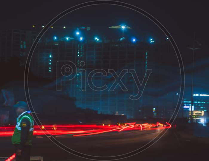 Long Exposure Of Moving Vehicles On City  Roads