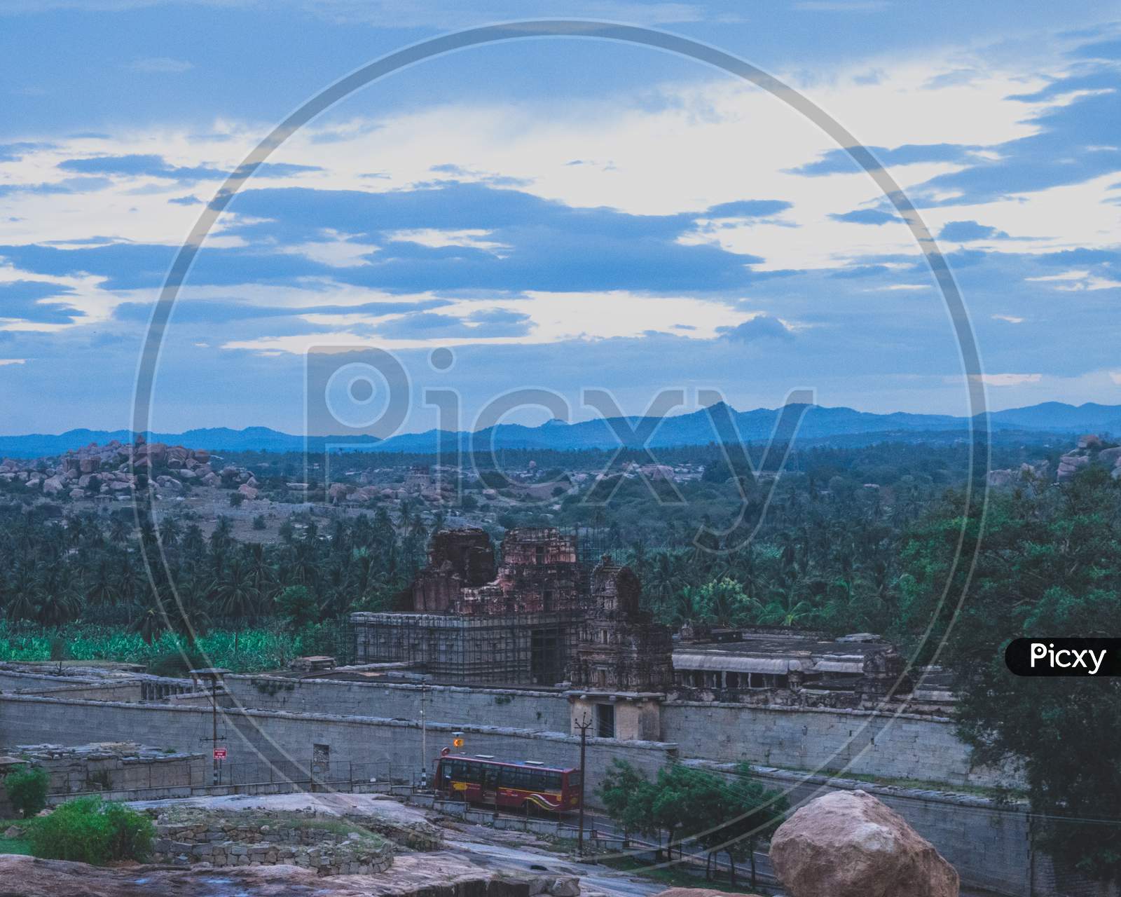 Landscape Of Rock Hills and Ancient Hindu temple Ruins  in Hampi
