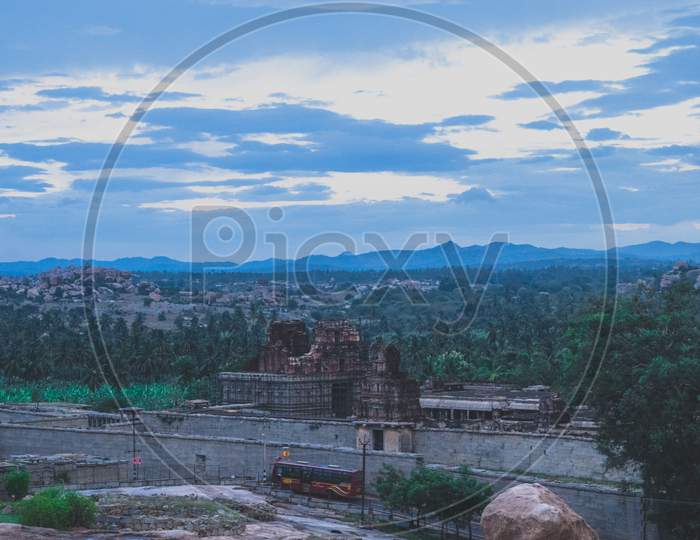 Landscape Of Rock Hills and Ancient Hindu temple Ruins  in Hampi
