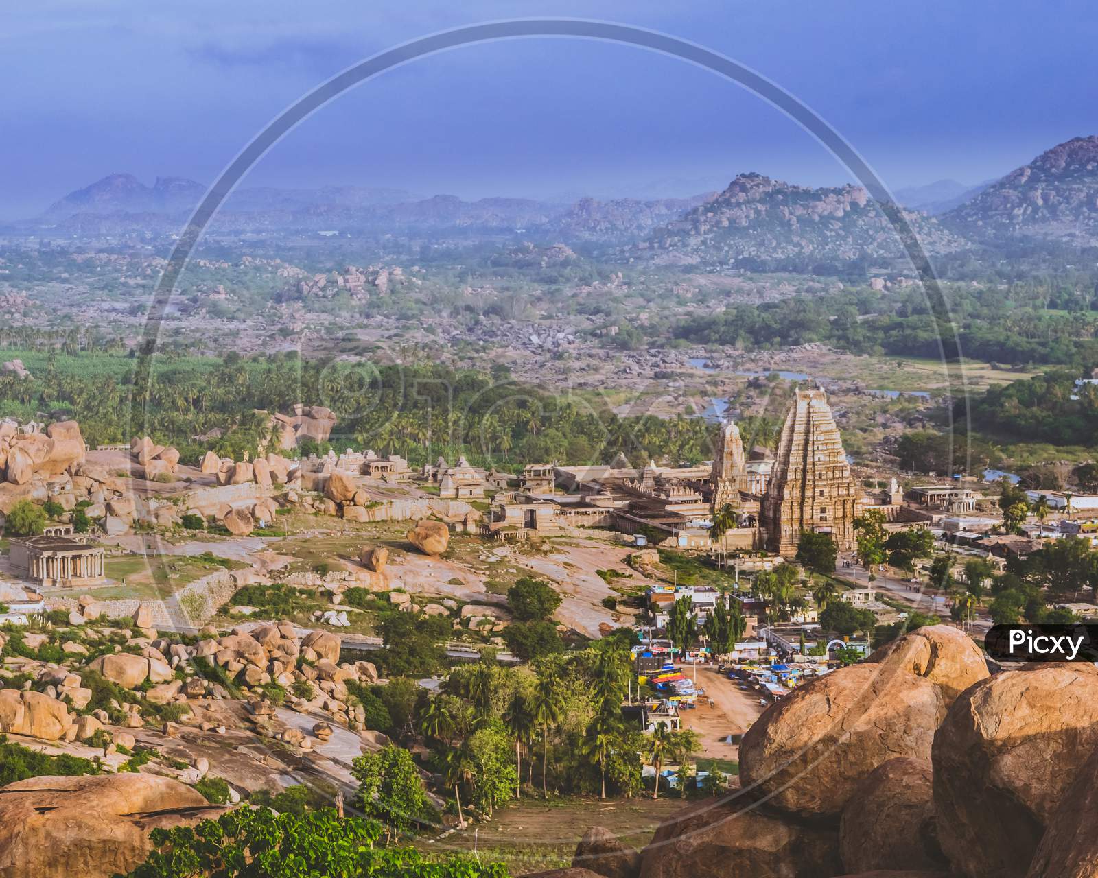 Landscape of Rock Hills And Ancient Hindu Temples in Hampi