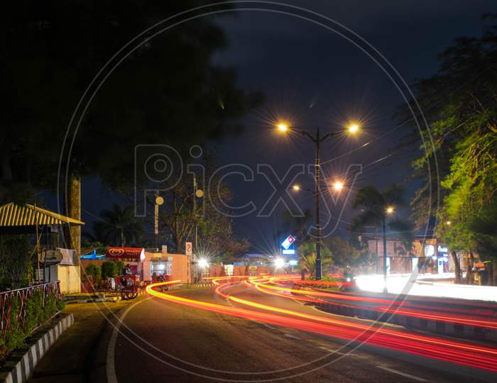 Long Exposure Of Moving Vehicles With  Light Patterns on a City Road