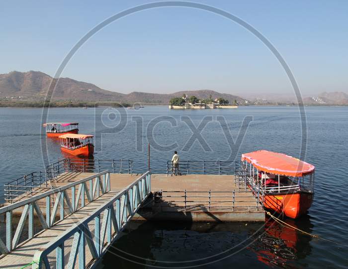 River Front With Tourism Boats In Udaipur