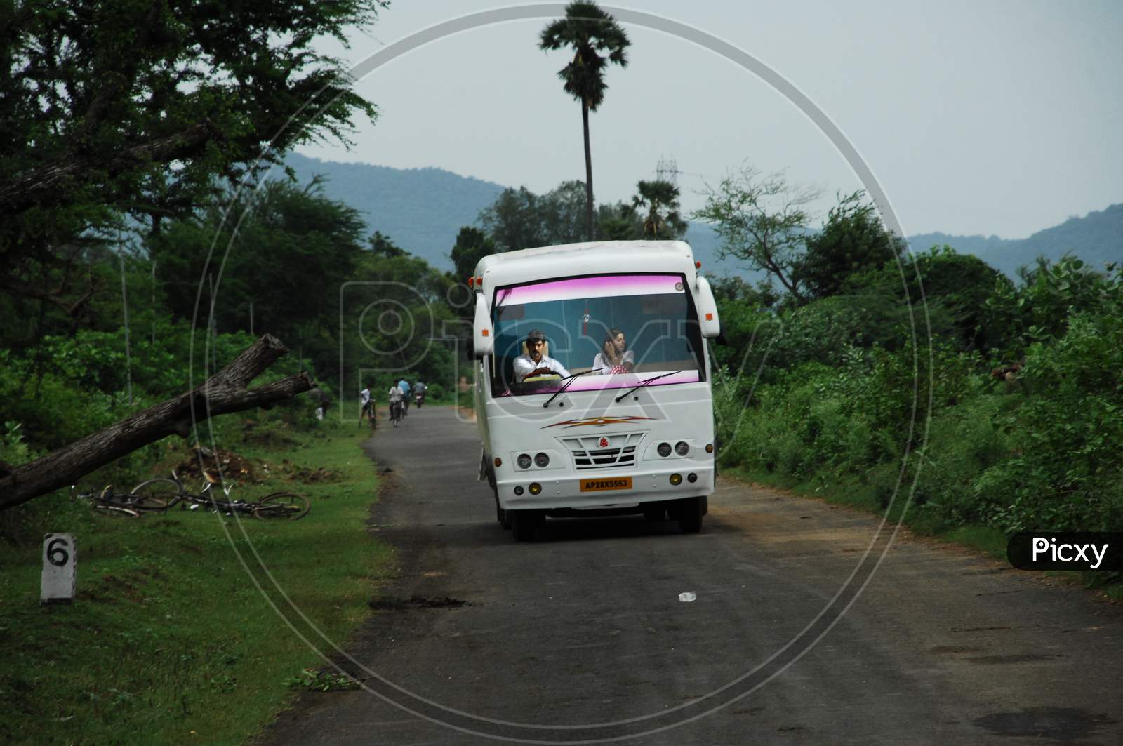 A Bus Moving On Road