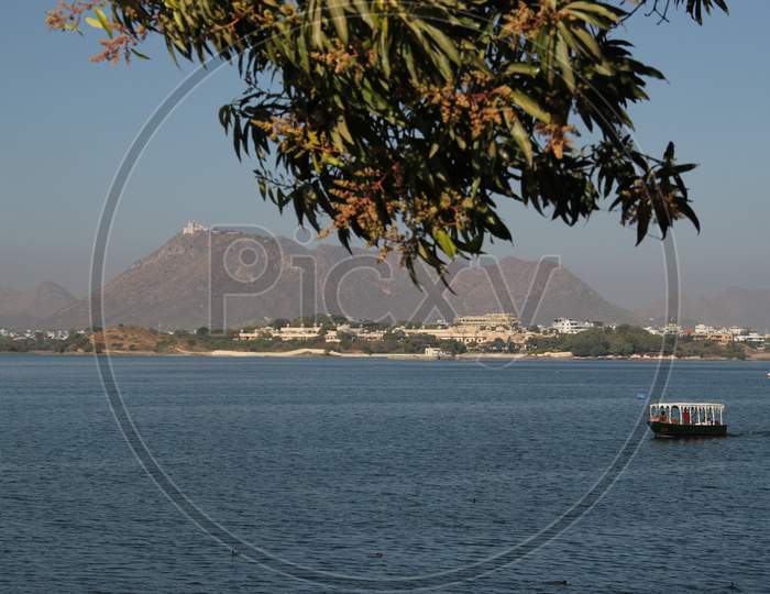 River Front With Tourism Boats In Udaipur