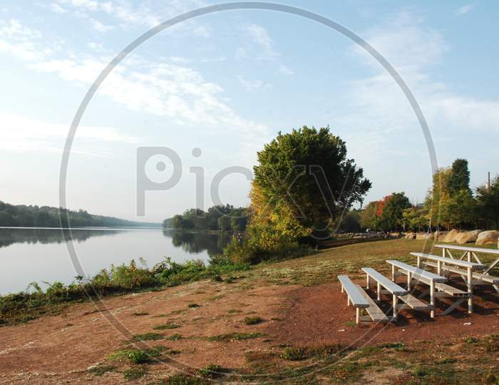 Landscape of wooden bench by the lake