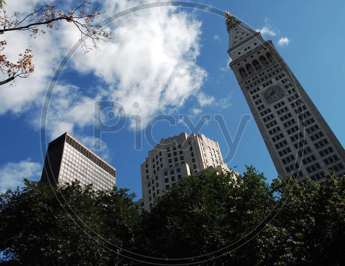 Canopy Of High Rise Buildings Over Blue Sky