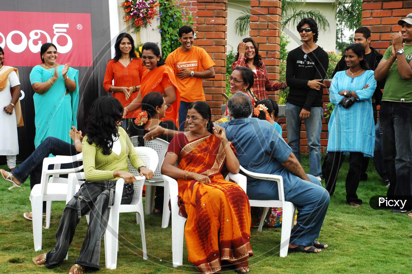 People Playing Musical Chairs Game in an event