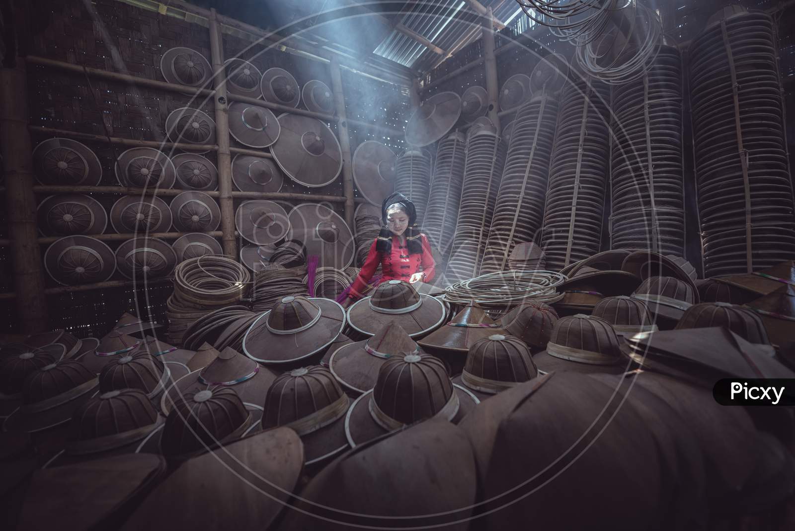 Asian Female Craftsman Making The Traditional Hat In The Old Traditional House In Inle Lake Village, Shan State, Myanmar, Traditional Artist Concept