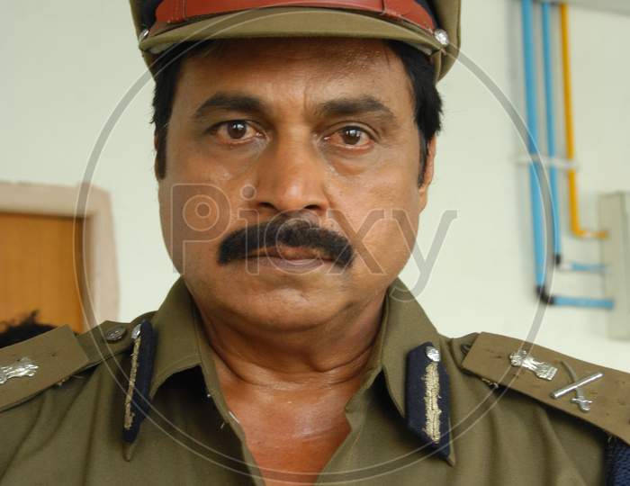Tollywood Actor Nagineedu in a police Costume