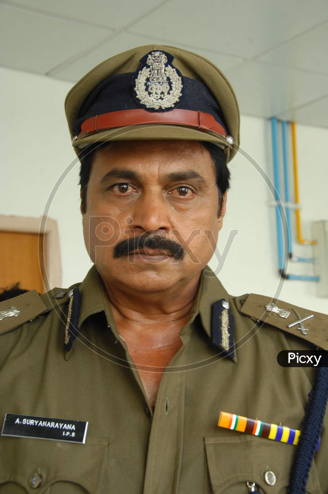 Tollywood Actor Nagineedu in a police Costume