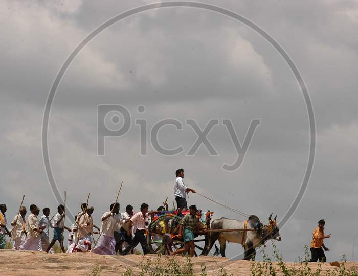 Tollywood Actor Kalyan Ram riding bullock cart with his men