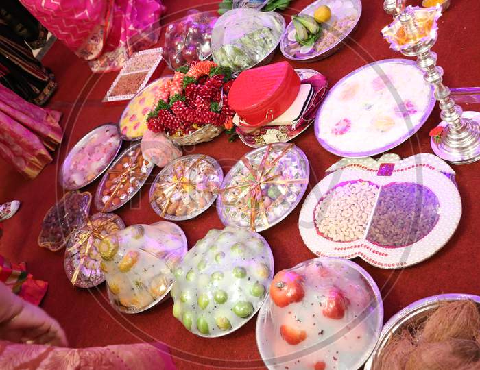 Sweets And Fruits Baskets At An Indian Wedding