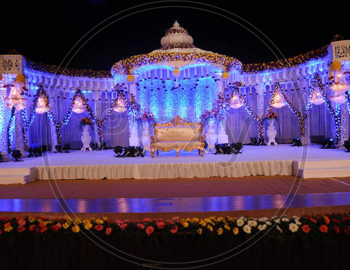 Wedding Reception Stage Decoration With Flowers and Lights