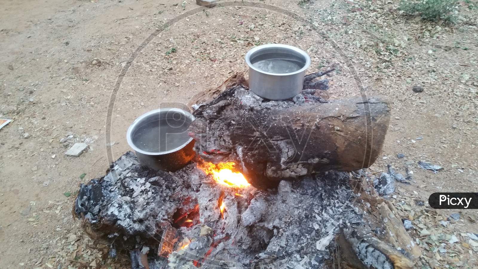 Water Heating in a Camp Fire