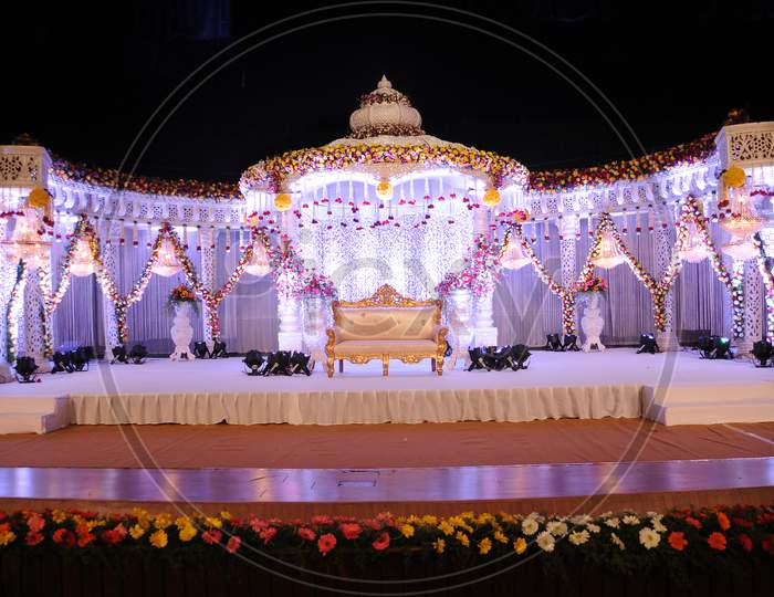 Wedding Reception Stage Decoration With Flowers and Lights