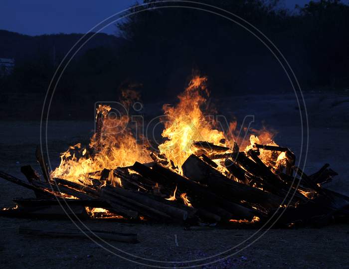 Cremation  Fire In a Crematorium With Blue Hour Sky Background