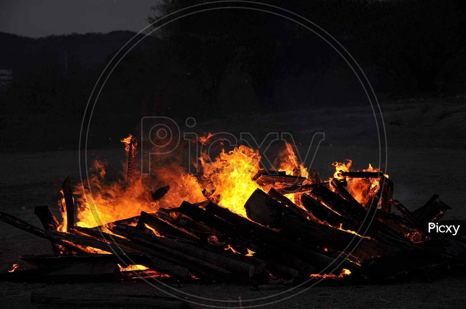 Cremation  Fire In a Crematorium With Blue Hour Sky Background