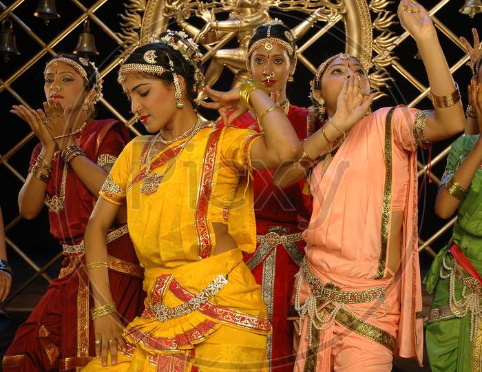 Young Women Performing Indian Traditional Dance in a Telugu Movie Song Shooting