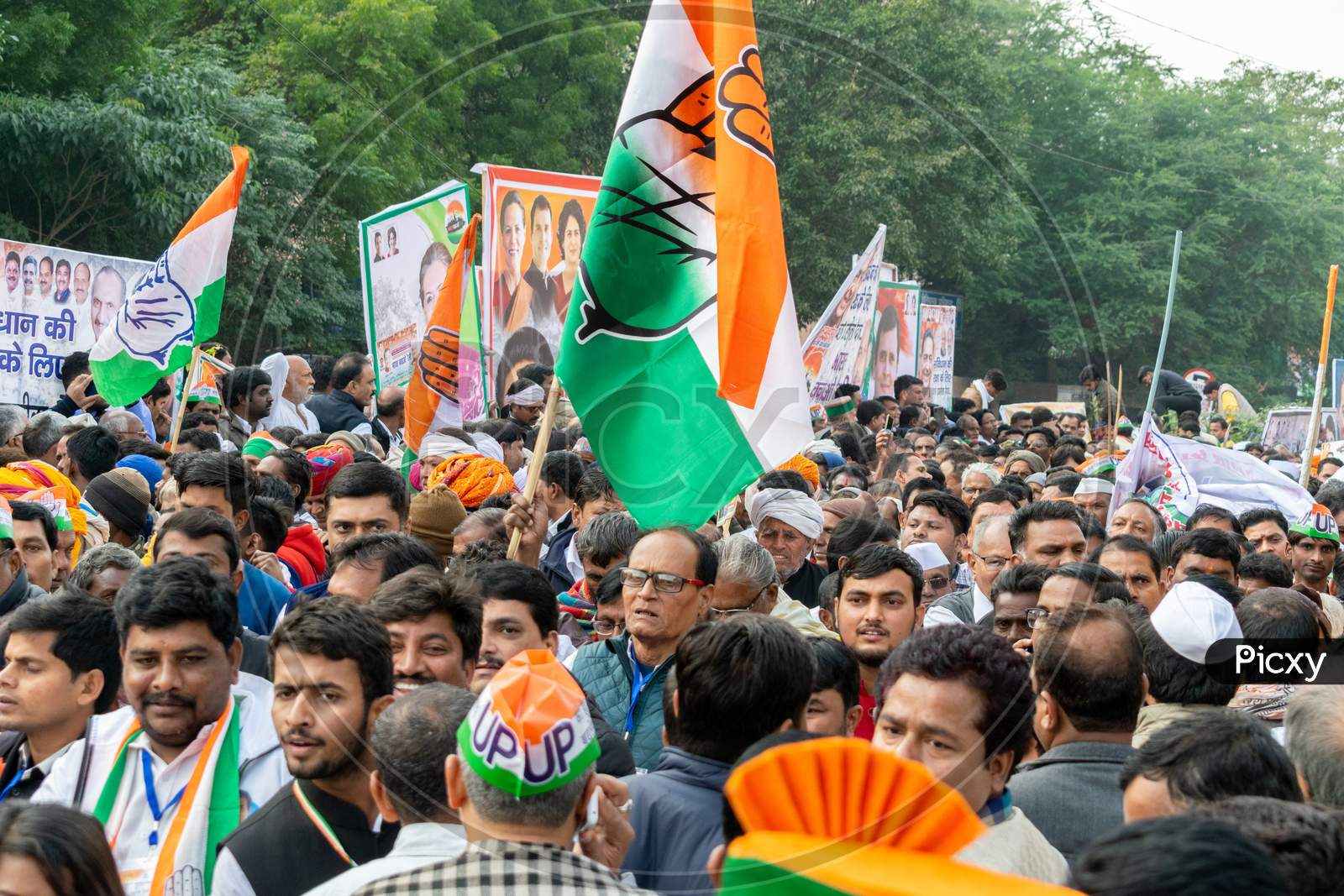 Congress workers with flags during 'Bharat Bachao' rally by Congress in Delhi to highlight Modi govt failures