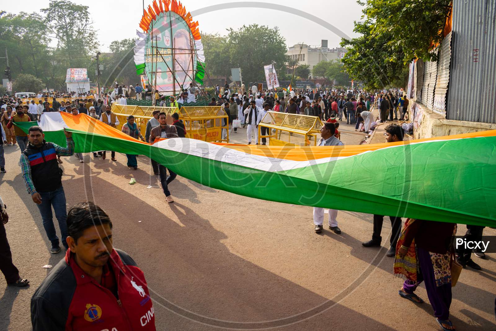 Congress workers carrying Indian flag during 'Bharat Bachao' rally by Congress in Delhi to highlight Modi govt failures