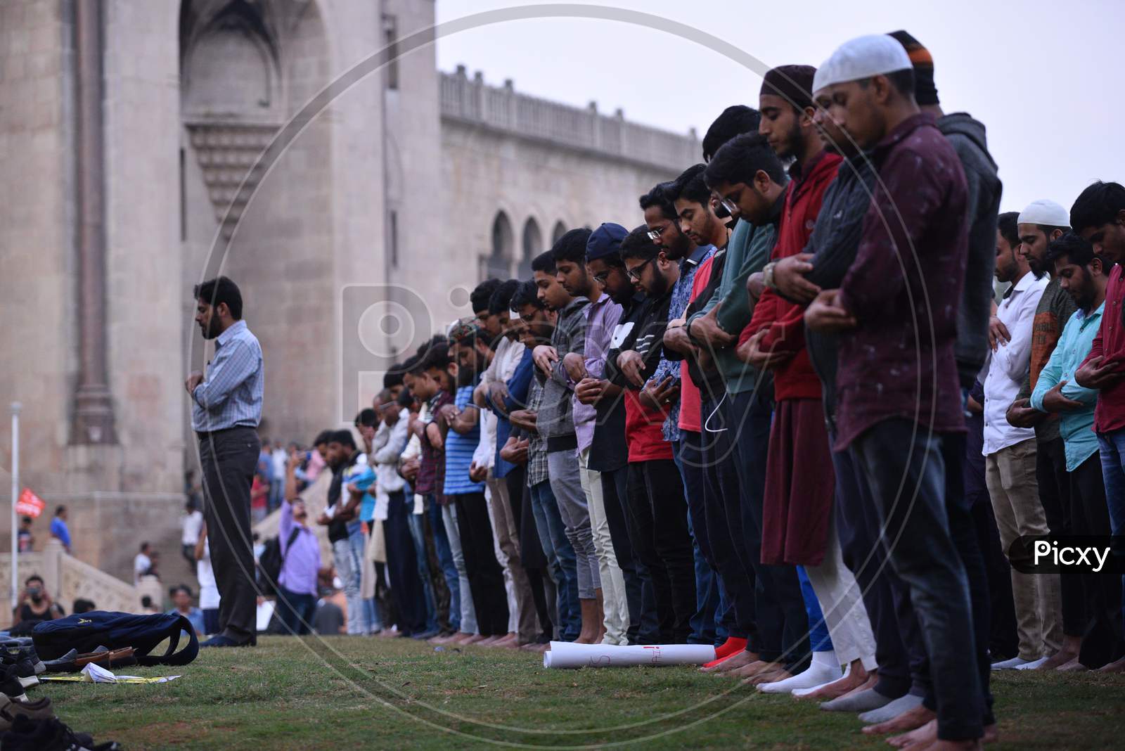 Protesters offer namaz in between protests against CAA 2019 at Osmania Arts College
