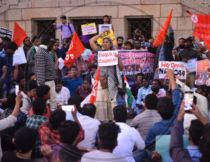Protesters hold placards and raise slogans against the NDA government as the contentious CAA 2019 has been passed.