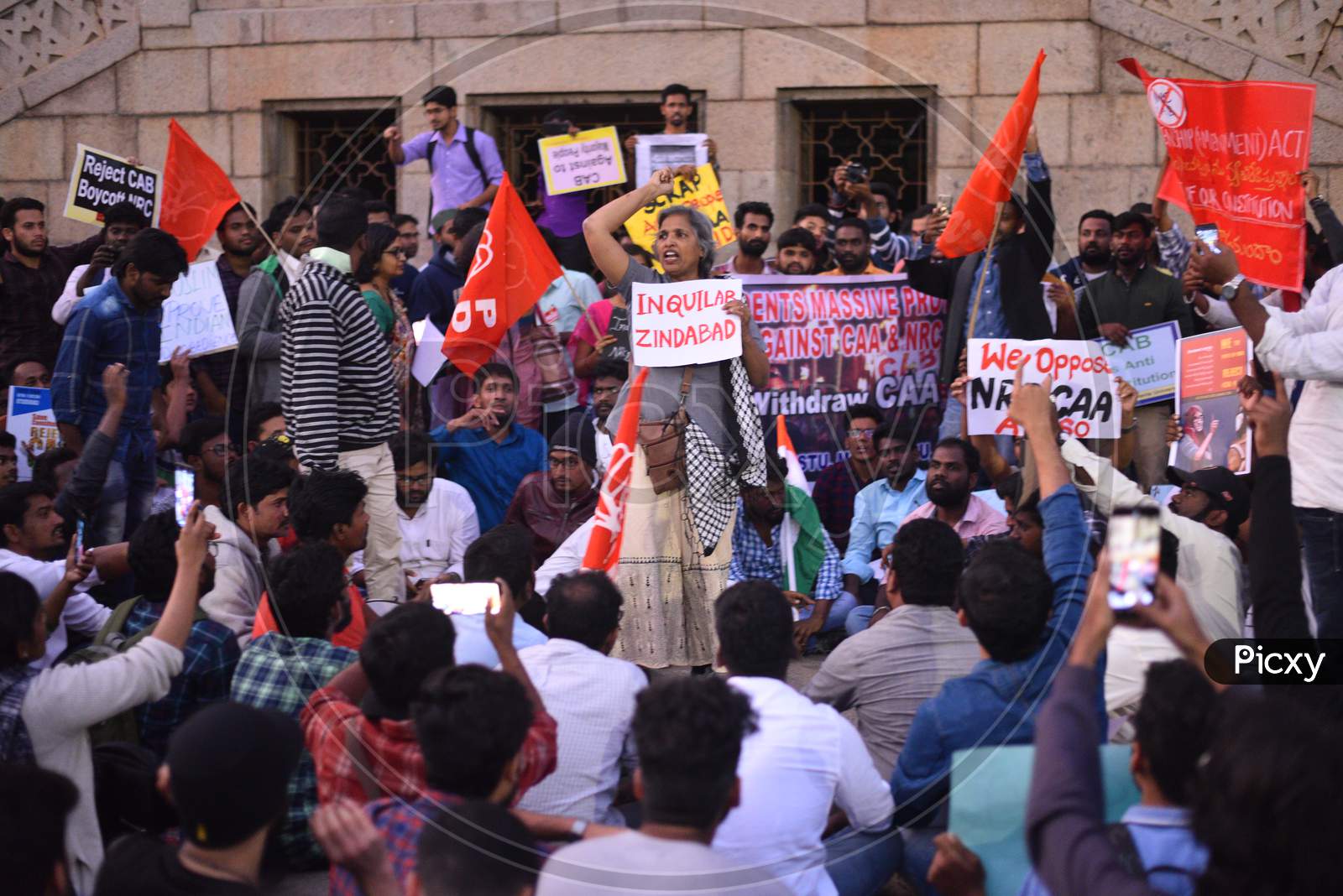 Protesters hold placards and raise slogans against the NDA government as the contentious CAA 2019 has been passed.
