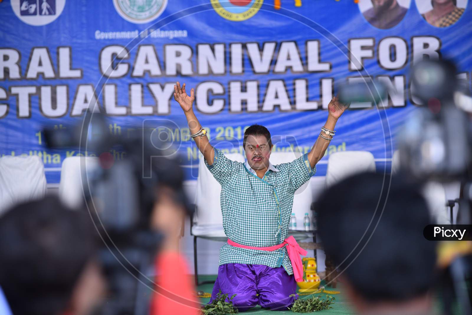 An intellectually challenged kid dances at Carnival for Intellectually challenged