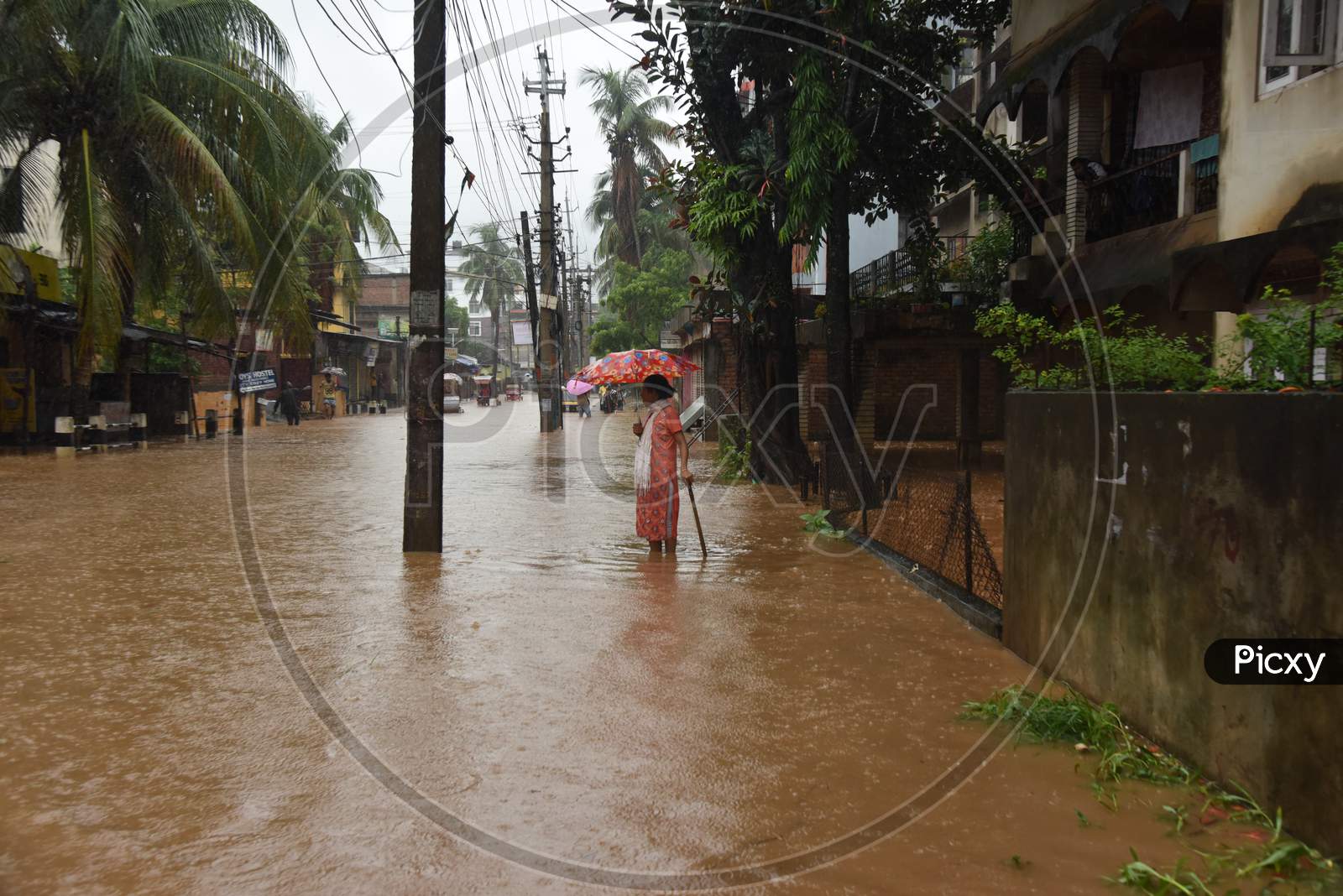 Pedestrians Walking on Flooded Roads  Due To Seasonal Floods In Guwahati City, Assam On June 13 2017