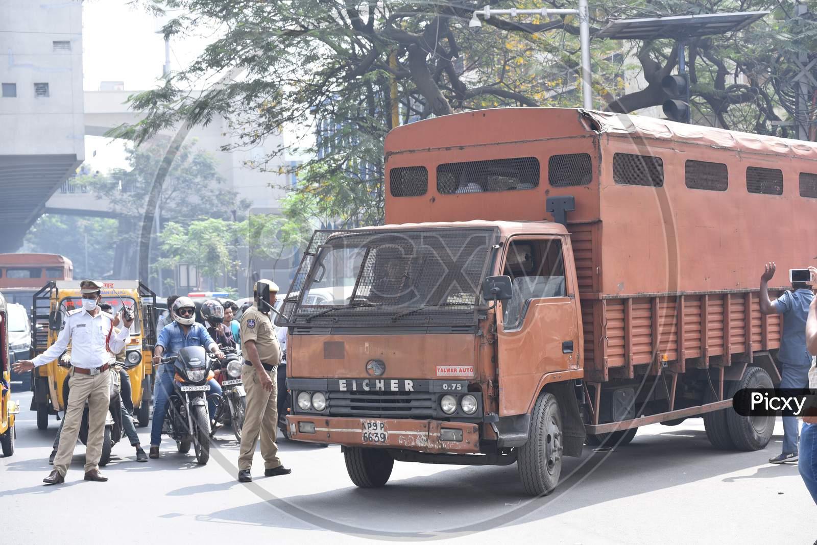 Detained protesters carrying in vehicles by Hyderabad Police who is protesting against Citizenship Amendmend Act at Exhibition Grounds on 19,December 2019.
