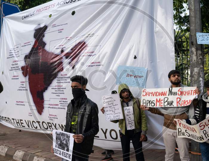 A map showing campus protests in India and Students protesting against CAA and NRC outside Jamia Millia Islamia, A Central University in New Delhi