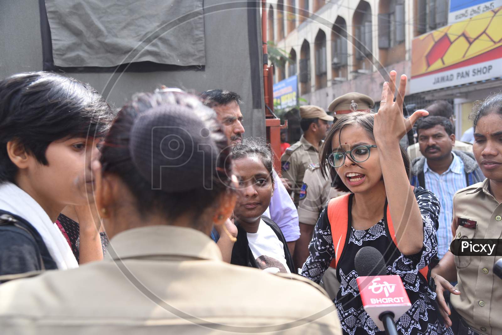 a woman Protester being detained in vehicles by Hyderabad Police who is protesting against Citizenship Amendmend Act at Exhibition Grounds on 19,December 2019.