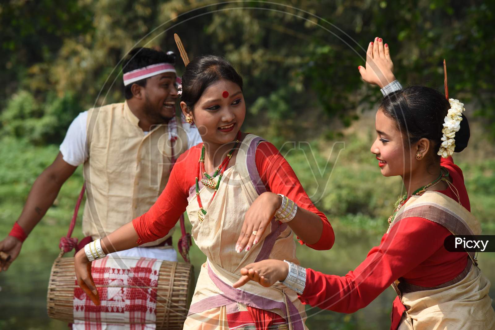 Image of Young Assamese Woman Performing Bihu Dance , A Traditional ...