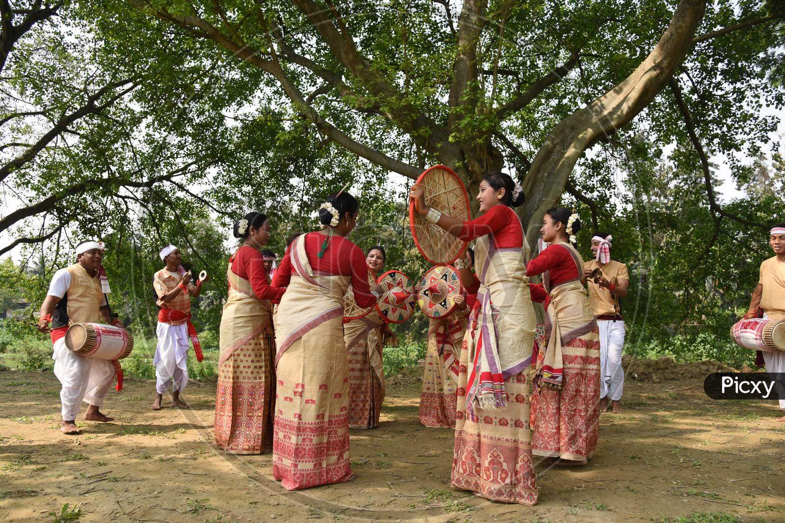 Image Of Young Assamese Woman Performing Bihu Dance , A Traditional ...