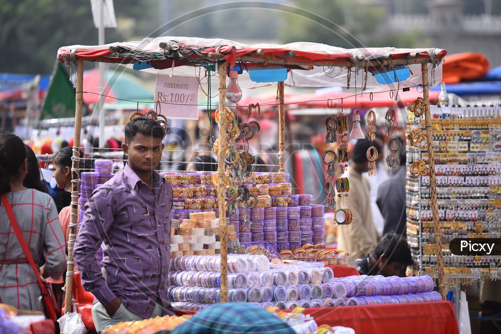 A street vendor selling ornaments at charminar