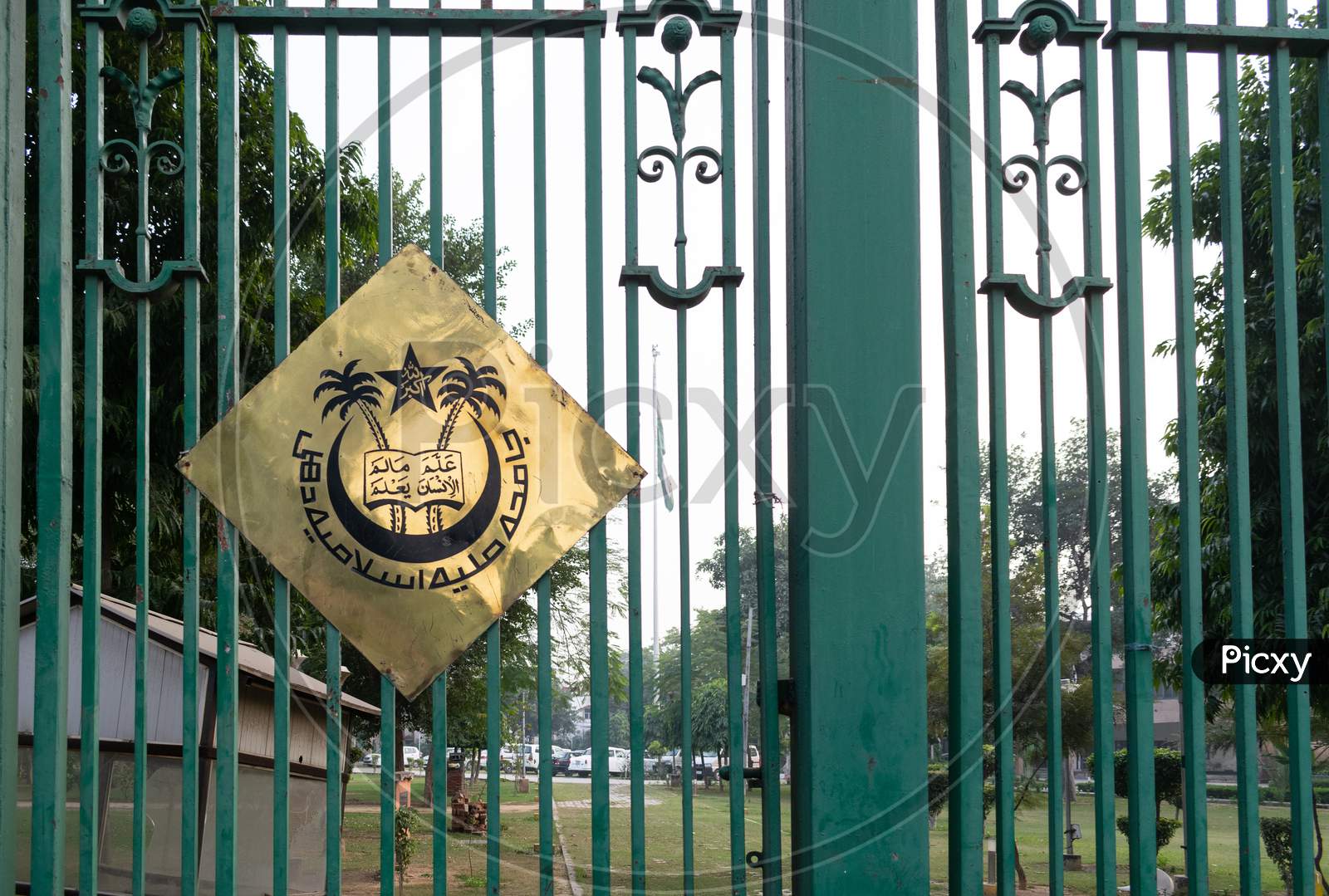 Logo of Jamia Millia Islamia University put on the gate