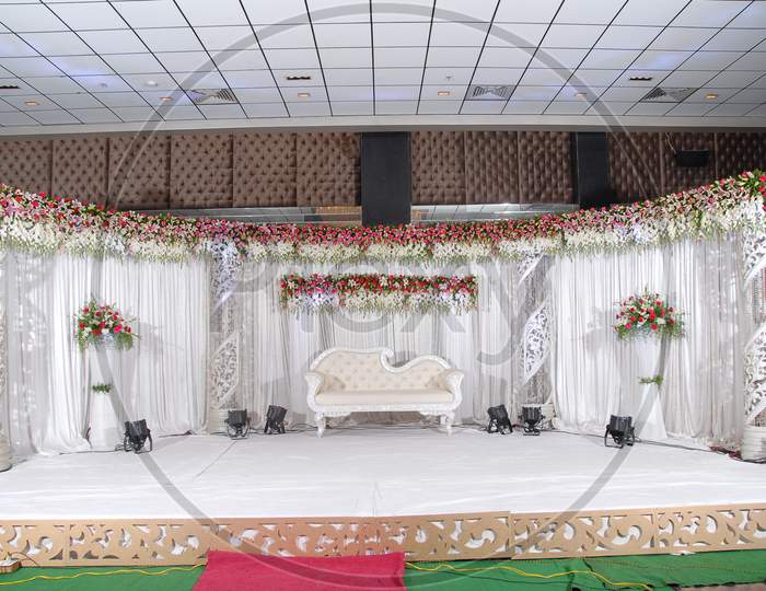View of floral white theme decorated stage