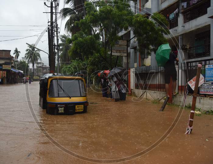 An Auto Or Tuk Tuk On Flooded Road Of Guwahati, Assam  June 13 2017