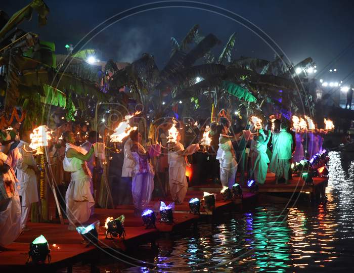 Priests Performing Aarti or Harathi For Holy River Bramaputra in Guwahati , Assam
