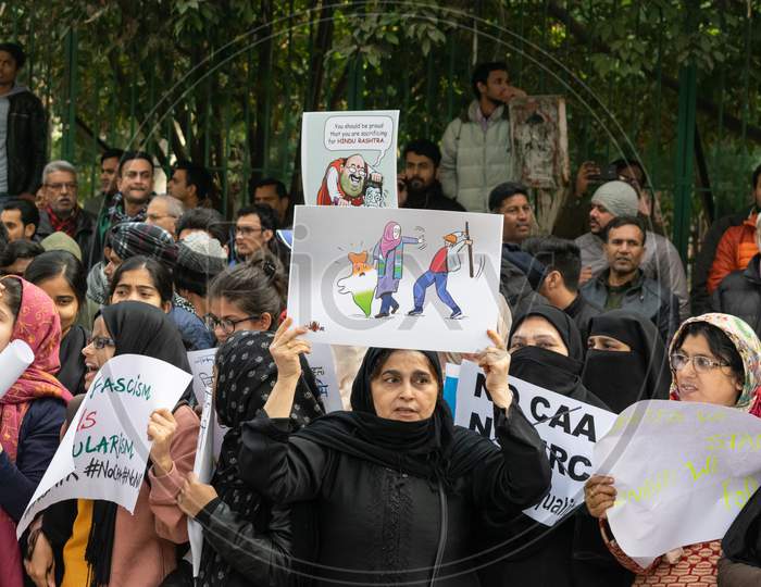 Women and others Protesting Against Caa And Nrc Outside Jamia Millia Islamia University