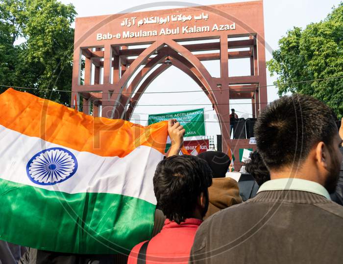 People With Indian Flag Present In The Protest Against Caa And Nrc Outside Bab E Maulana Abul Kalam Azad Gate No 7 Jamia Millia Islamia A Central University In New Delhi