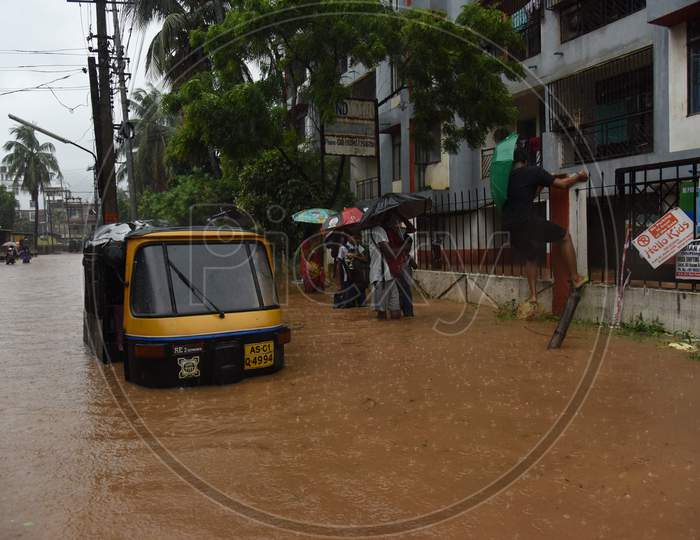 An Auto Or Tuk Tuk On Flooded Road Of Guwahati, Assam  June 13 2017