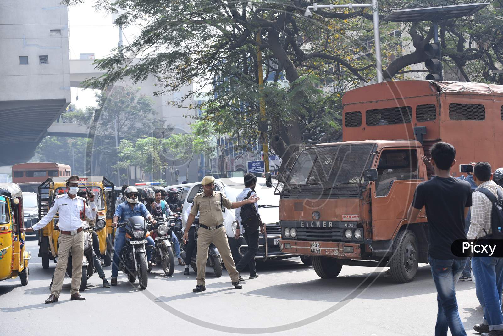 Detained protesters carrying in vehicles by Hyderabad Police who is protesting against Citizenship Amendmend Act at Exhibition Grounds on 19,December 2019.