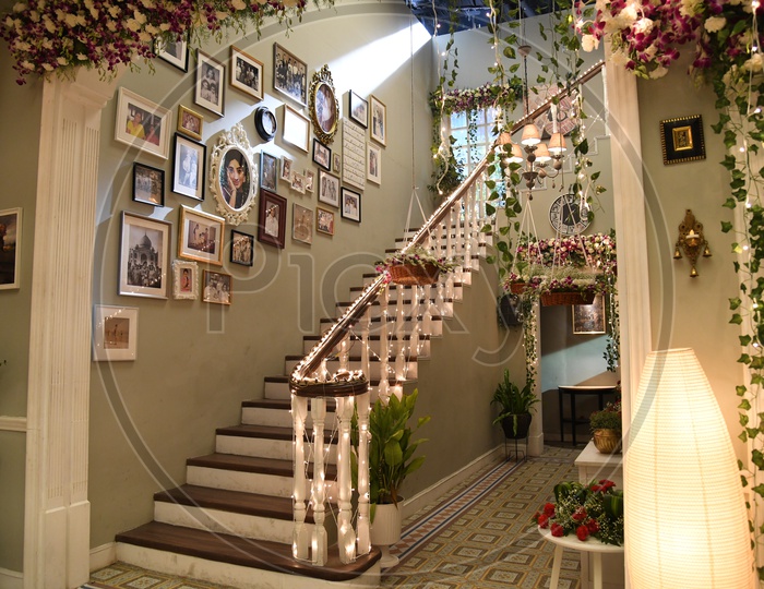 Interior Of a House Wall With Photo Frames And  Led Lights Decoration