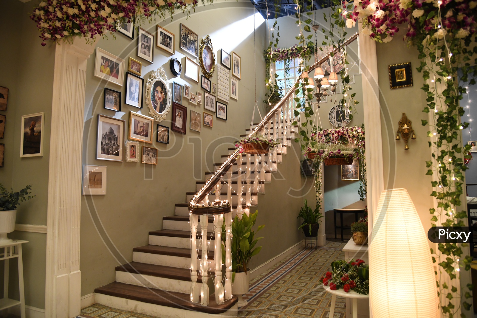 Interior Of a House Wall With Photo Frames And  Led Lights Decoration