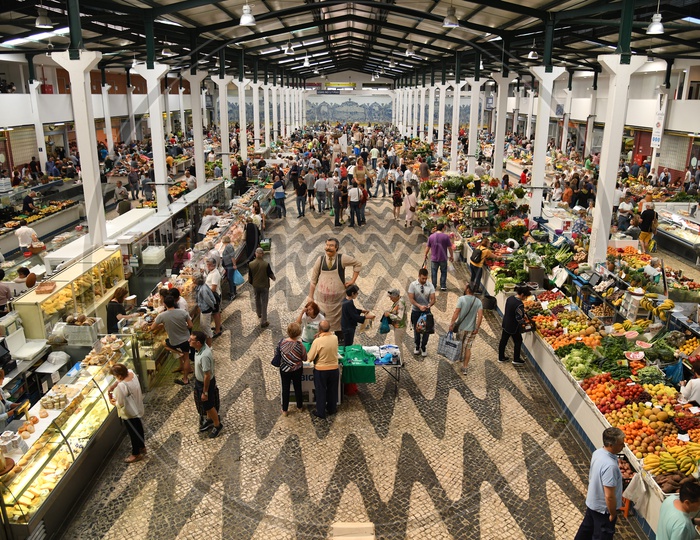 People Shopping for Groceries in a Market, Portugal