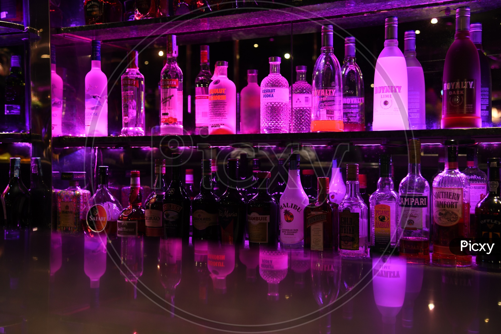 Alcohol or Wine Bottles At a Bar Counter