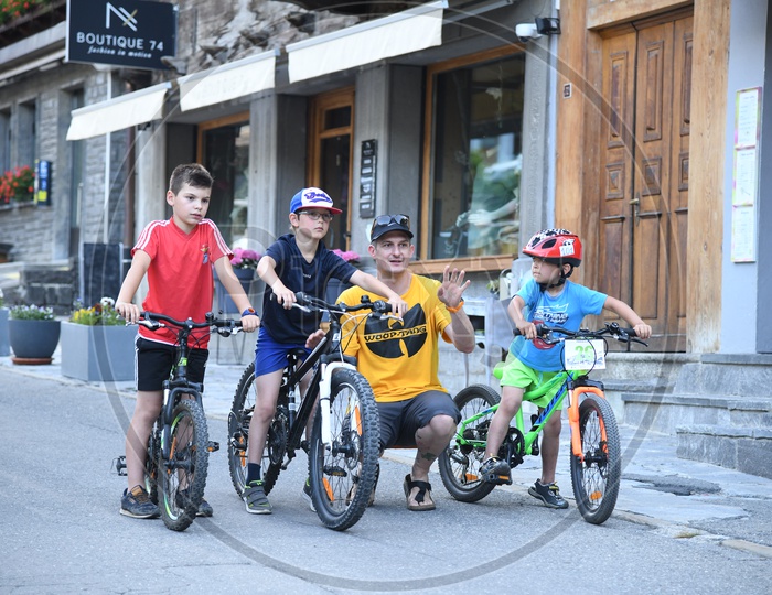 Kids on Bicycle with their Father, Portugal