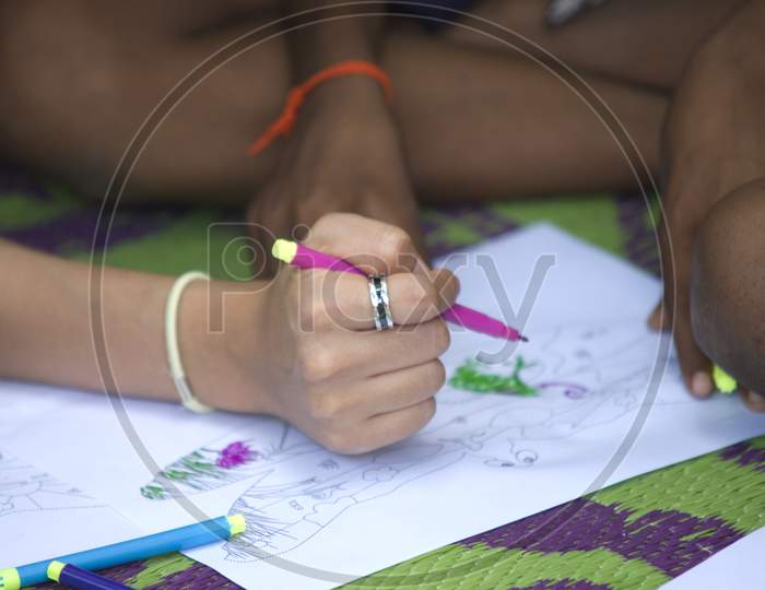 Indian School girl drawing hands
